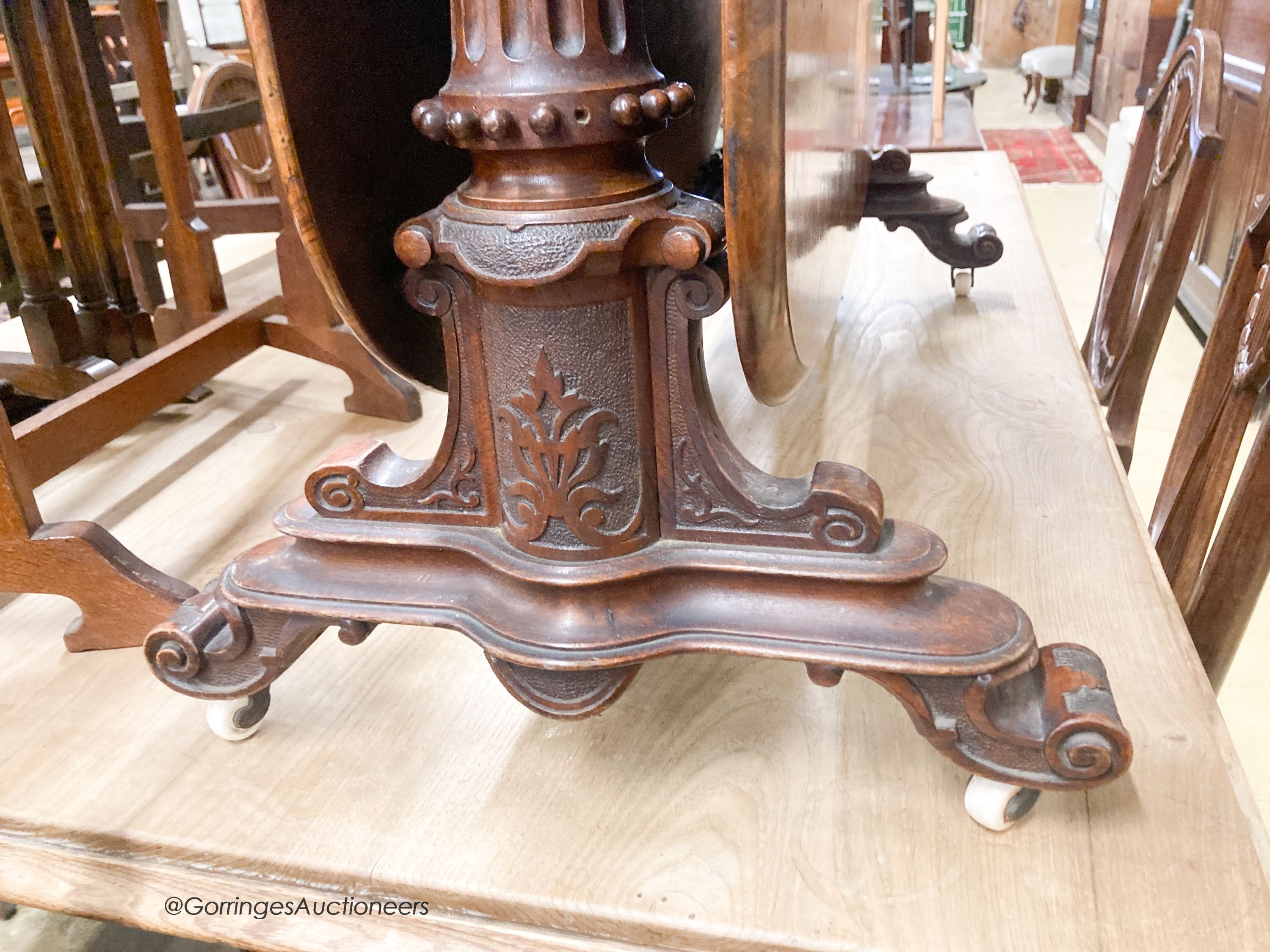 A Victorian burr walnut Sutherland table. 120cm extended, H-66cm.